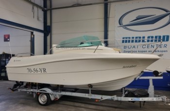 Jeanneau Merry Fisher 585 met Suzuki DF90A en trailer